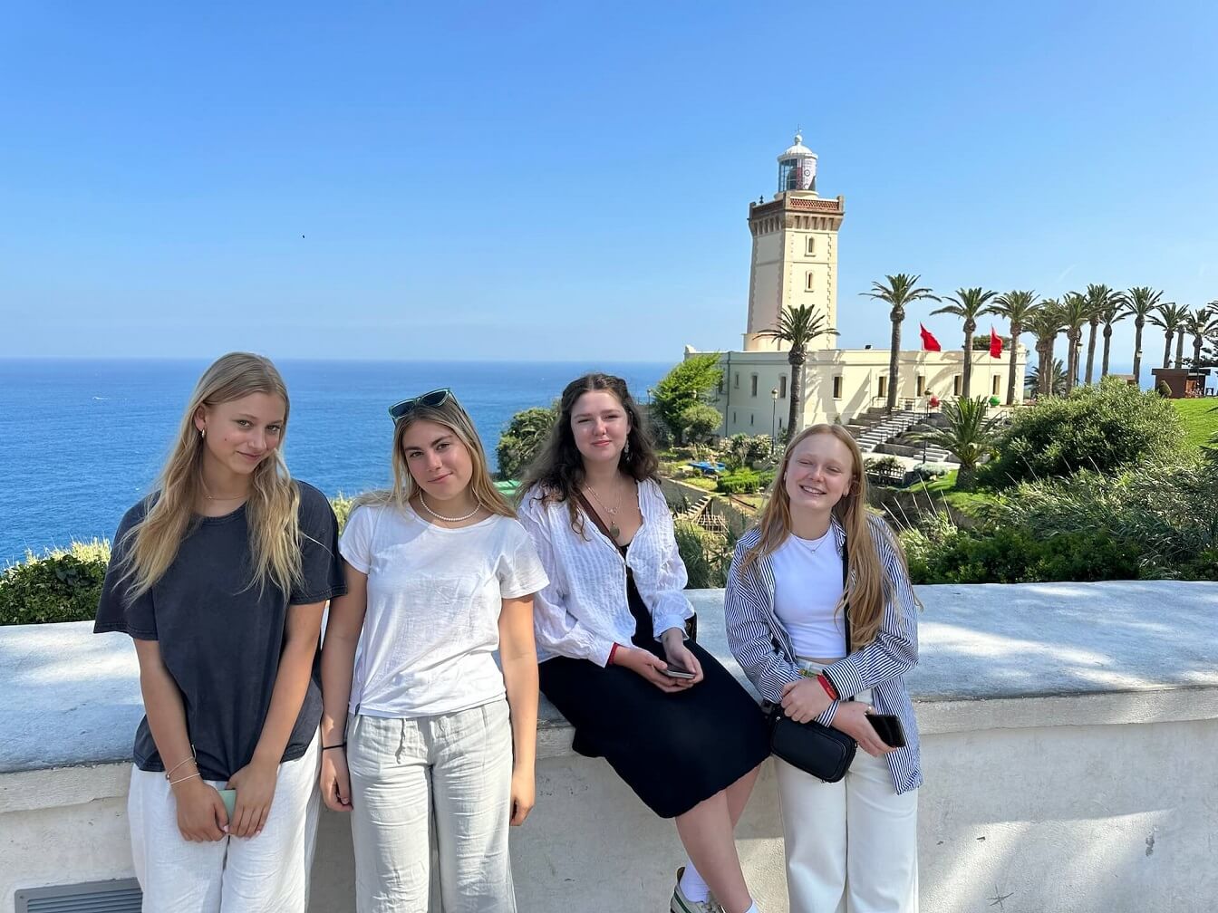 Four girls from our High School Program in a lighthouse