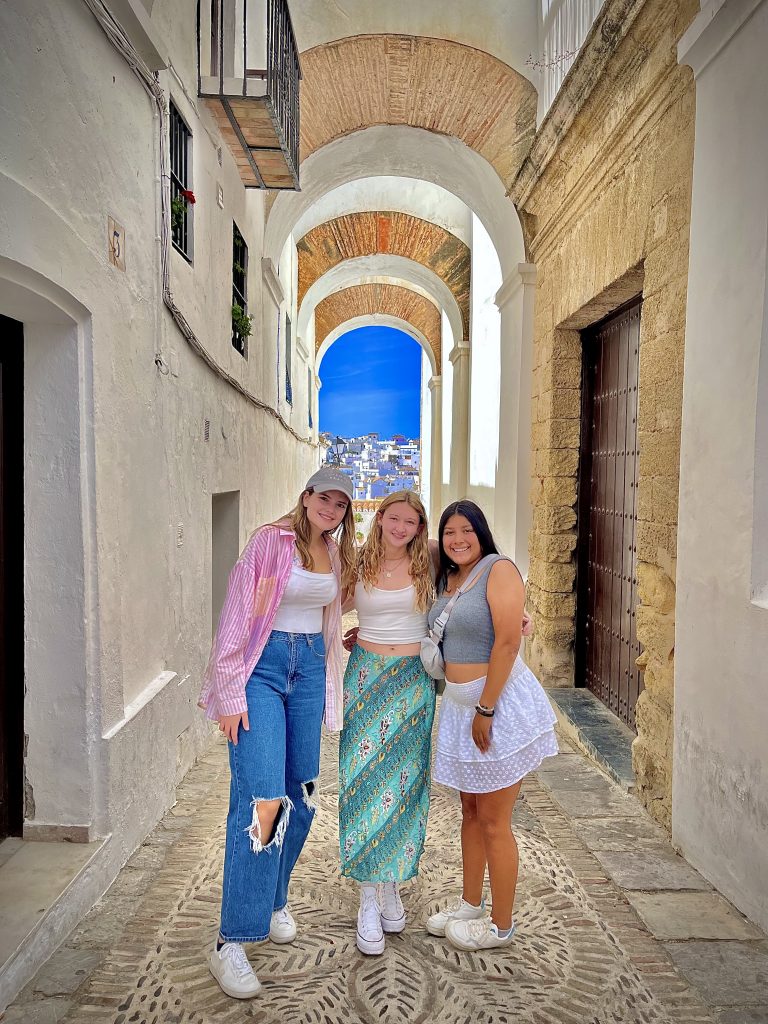 Students walking through historic streets in Spain during study abroad experience